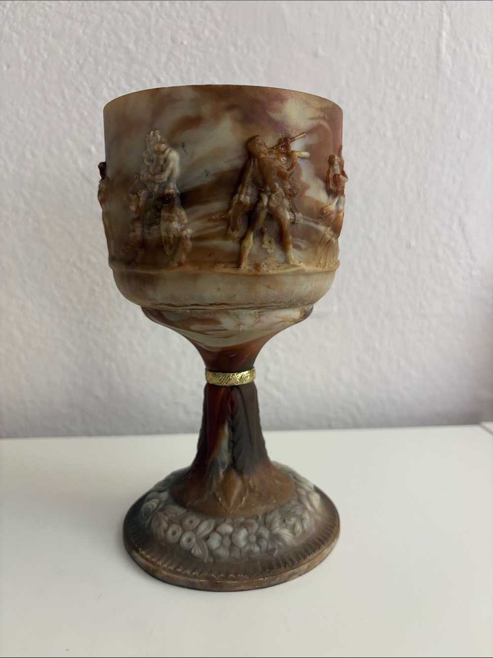 Brown Marbled Art Glass Goblet with Relief Figures